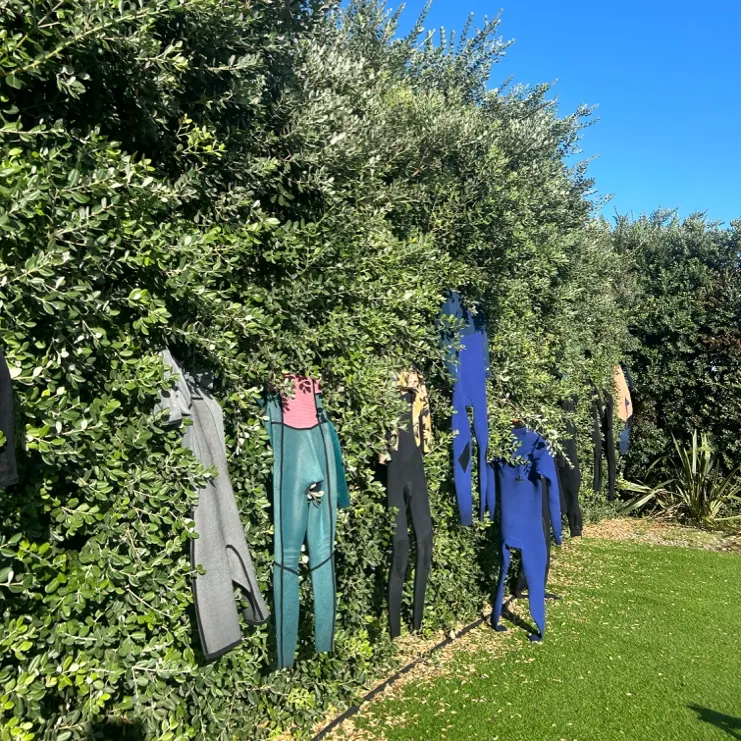 Wetsuits drying after a session in Portugal
